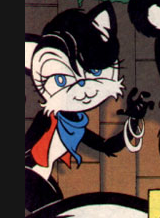 An humanoid black female cat with white face and underbelly. She has silver bangles, blue scarf and red vest, and she's smiling and waving toward the audience.