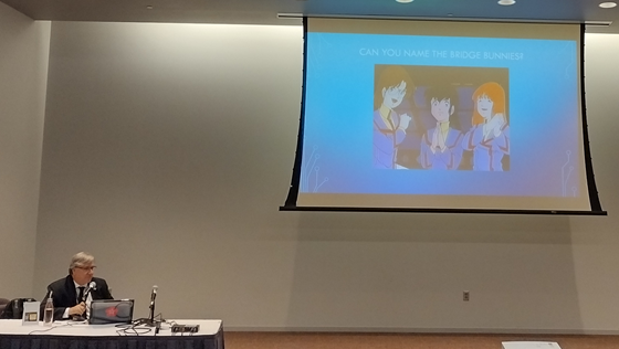 Panelist displaying a slide titled "Can you name the bridge bunnies [from Macross]?"