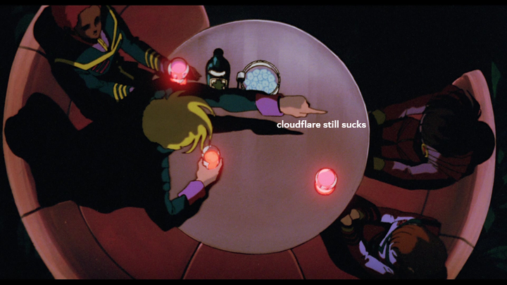 An overhead view of 4 people sitting at a table. Roy drunkenly leans across to point at Rick and Lisa. There's added text saying "cloudflare still sucks" along his reach.