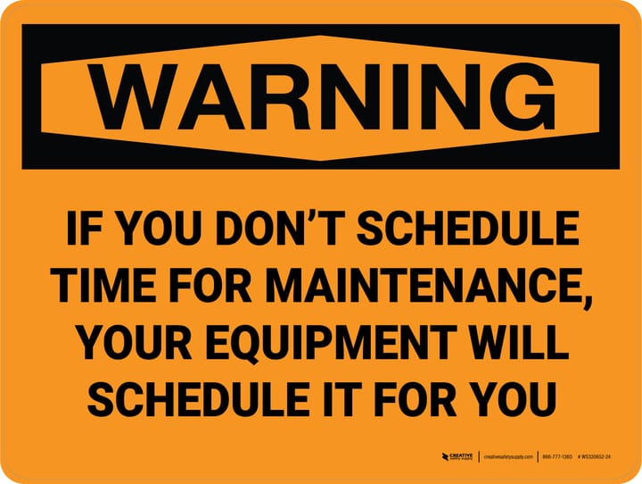 A wall sign stating this warning: If You Don't Schedule Maintenance, Your Equipment Will Schedule It For You.
