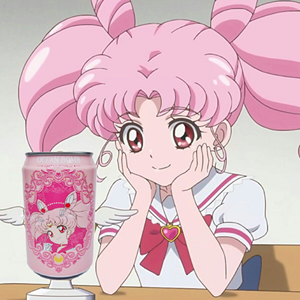 Chibi Usa, looking lovingly at a soda with her face on it.